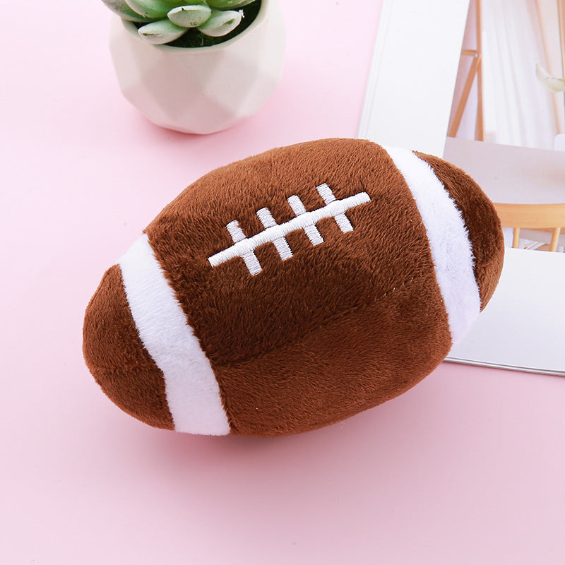 Jouet en peluche avec balle simulant un couinement